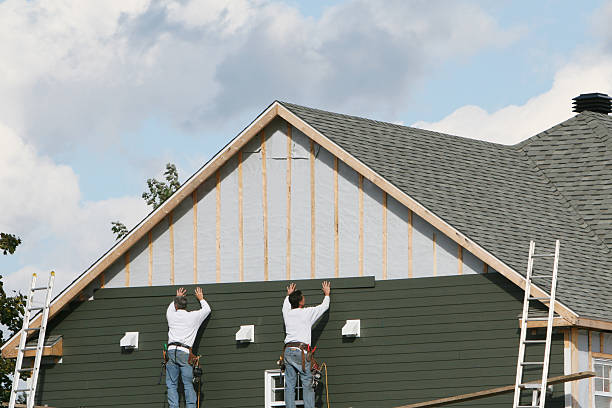 Professional Storm Damage Siding Repair technician working in Ambridge, PA